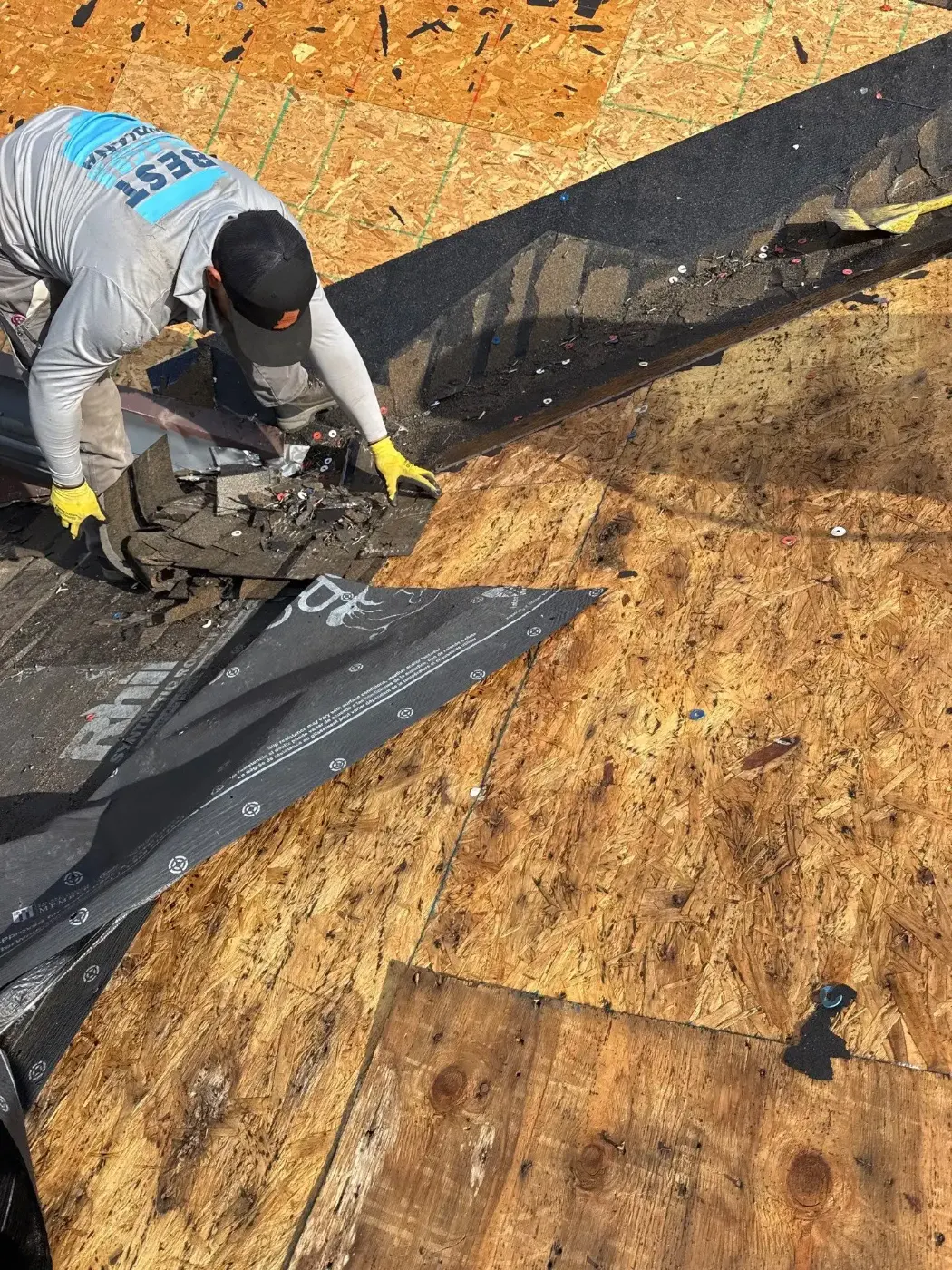 Tarping and dry-in on a Hope commercial roof